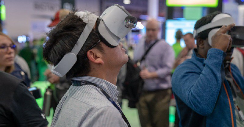 CenturyLink booth attendee using Lenovo Mirage Solo VR headset